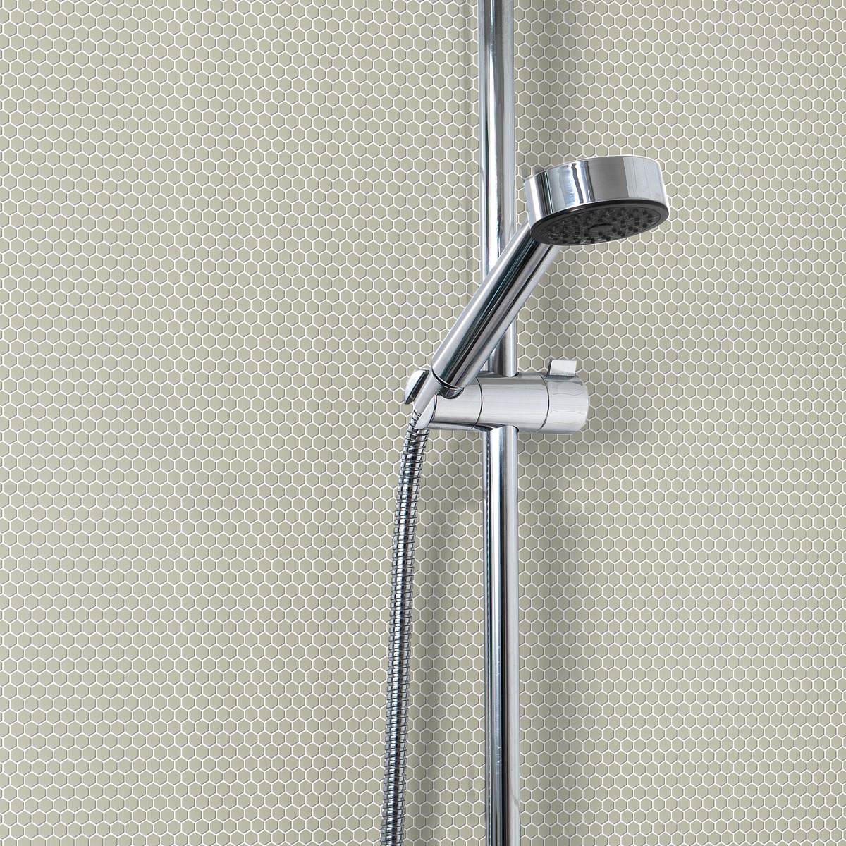 Avora Solid Hexagons in Flaxen, a matte cast recycled glass mosaic shower wall